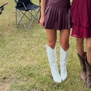 Tall white cowboy boots